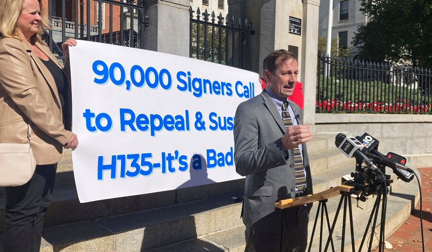 Toby Leary, a gun shop owner and Second Amendment advocate, announces that firearms activists have collected enough signatures to place a question on the Massachusetts 2026 ballot that would repeal the state's new sweeping gun law, Oct. 8, 2024, outside the Massachusetts Statehouse in Boston. (AP Photo/Steve LeBlanc, File)