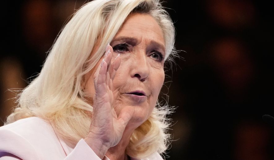 Leader of France's far-right National Rally (RN) party, Marine Le Pen, delivers a speech during the party's 19th Congress, in Orleans, France, Sunday, Oct. 25, 2026. (AP Photo/Teresa Suarez)