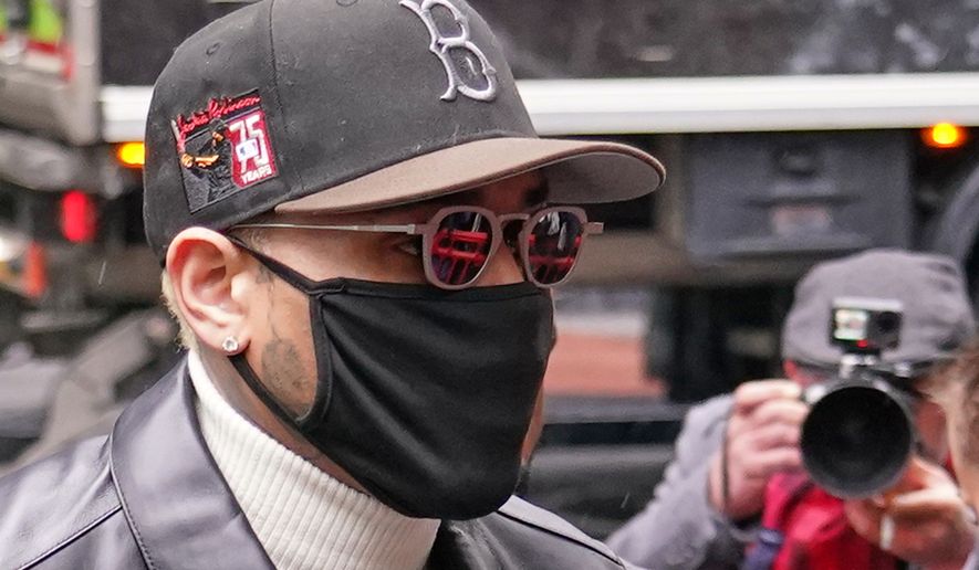 R&B singer Chris Brown arrives at Southwark Crown court for being sentenced over a nightclub attack in London, Monday, Oct. 26, 2026.(AP Photo/Alberto Pezzali)