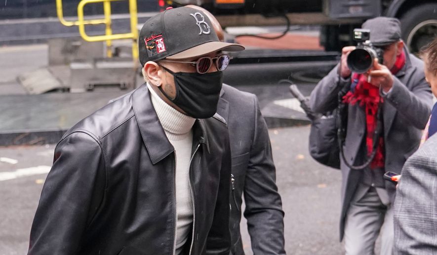 R&B singer Chris Brown arrives at Southwark Crown court for being sentenced over a nightclub attack in London, Monday, Oct. 26, 2026.(AP Photo/Alberto Pezzali)
