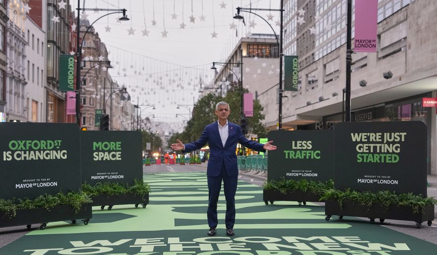 The Mayor of London, Sadiq Khan poses for the media in Oxford Street as it becomes traffic-free and pedestrianized in London, Monday, Oct. 26, 2026. (AP Photo/Alastair Grant)