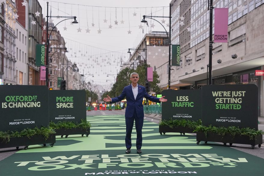 The Mayor of London, Sadiq Khan poses for the media in Oxford Street as it becomes traffic-free and pedestrianized in London, Monday, Oct. 26, 2026. (AP Photo/Alastair Grant)