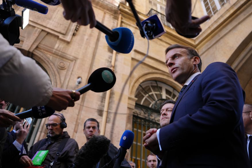 French President Emmanuel Macron addresses the media in Marseille, France, Monday, Oct. 26, 2026. (AP Photo/Aurelien Morissard, Pool)