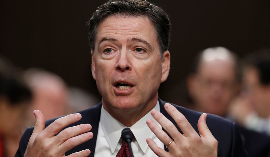 FILE - Former FBI Director James Comey speaks during a Senate Intelligence Committee hearing on Capitol Hill, Thursday, June 8, 2017, in Washington. (AP Photo/Alex Brandon, File)