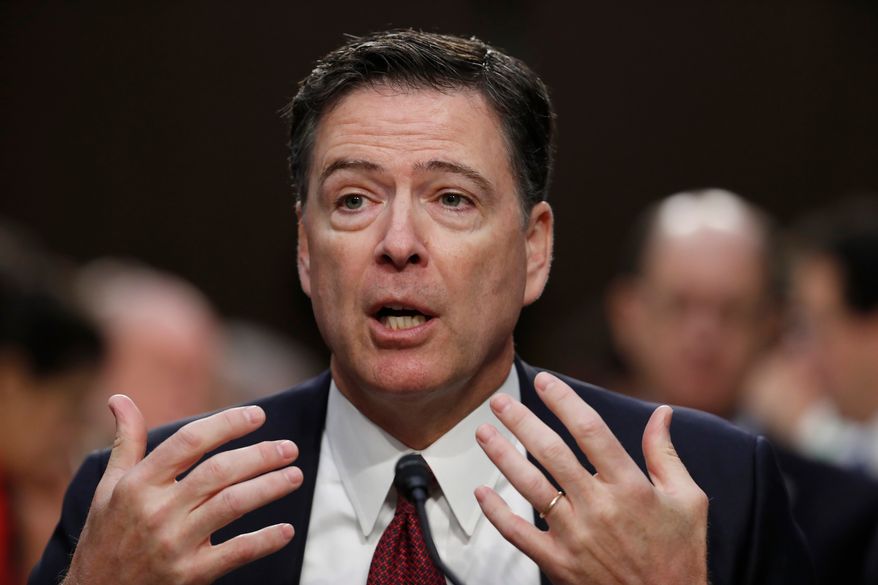 FILE - Former FBI Director James Comey speaks during a Senate Intelligence Committee hearing on Capitol Hill, Thursday, June 8, 2017, in Washington. (AP Photo/Alex Brandon, File)