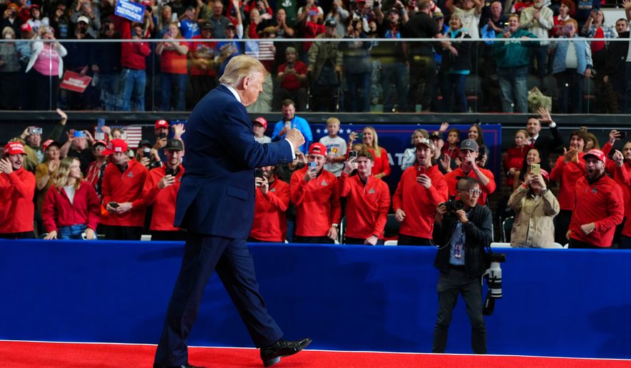 President Donald Trump arrives to speak during a campaign rally at McMorran Place Sports and Entertainment Center, Sunday, Oct. 25, 2026, in Port Huron, Mich. (AP Photo/Julia Demaree Nikhinson)
