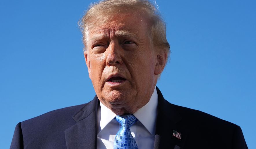 President Donald Trump talks to reporters before boarding Air Force One, at Joint Base Andrews, Md., Monday, Oct. 26, 2026, en route to a campaign rally in Mississippi. (AP Photo/Jacquelyn Martin)