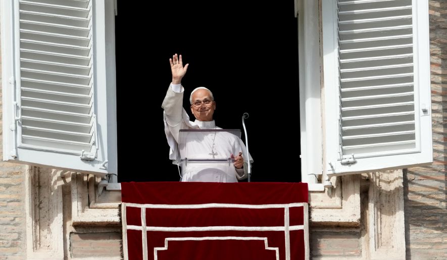 Pope Leo XIV delivers the Angelus noon prayer in St. Peter's Square, at the Vatican, Sunday, Oct. 25, 2026. (AP Photo/Gregorio Borgia)