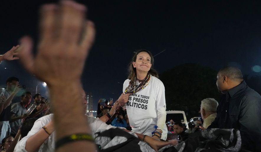 Venezuelan opposition leader and Nobel Peace Prize laureate Maria Corina Machado arrives in Caracas following her return to the country after months abroad, Sunday, Oct. 25, 2026.(AP Photo/Ariana Cubillos)