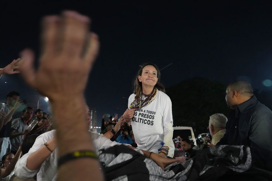 Venezuelan opposition leader and Nobel Peace Prize laureate Maria Corina Machado arrives in Caracas following her return to the country after months abroad, Sunday, Oct. 25, 2026.(AP Photo/Ariana Cubillos)