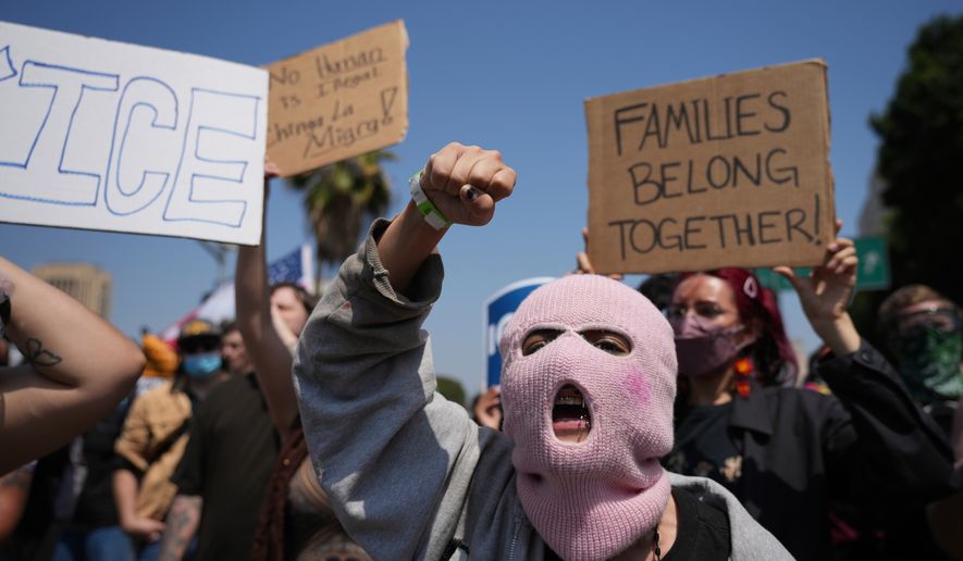 Protesters denounce ICE, U.S. Immigration and Customs Enforcement, Monday, June 9, 2025, in downtown Los Angeles. (AP Photo Jae Hong)