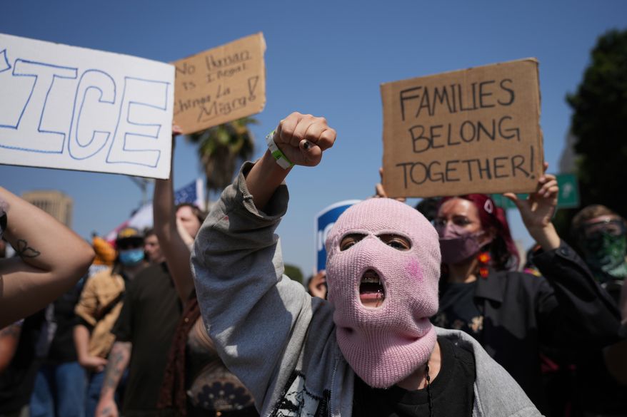 Protesters denounce ICE, U.S. Immigration and Customs Enforcement, Monday, June 9, 2025, in downtown Los Angeles. (AP Photo Jae Hong)