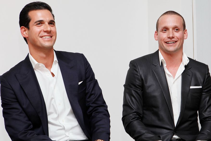 FILE - Oren and Tal Alexander speak at a panel at the Rockstars of Real Estate Event in New York., on Sept. 3, 2013. (Photo by Amy Sussman/Invision for DETAILS Magazine/AP Images, File)