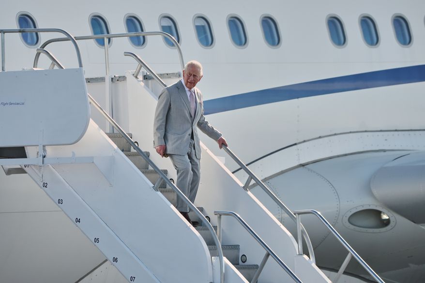 Britain's King Charles III deplanes at Lynden Pindling Airport in Nassau, Bahamas, Tuesday, Oct. 27, 2026. (AP Photo/Tim Aylen)