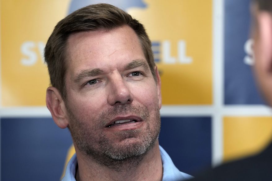 Rep. Eric Swalwell, D-Calif., talks with reporters after holding a town hall meeting in Sacramento, Calif., April 7, 2026. (AP Photo/Rich Pedroncelli, File)