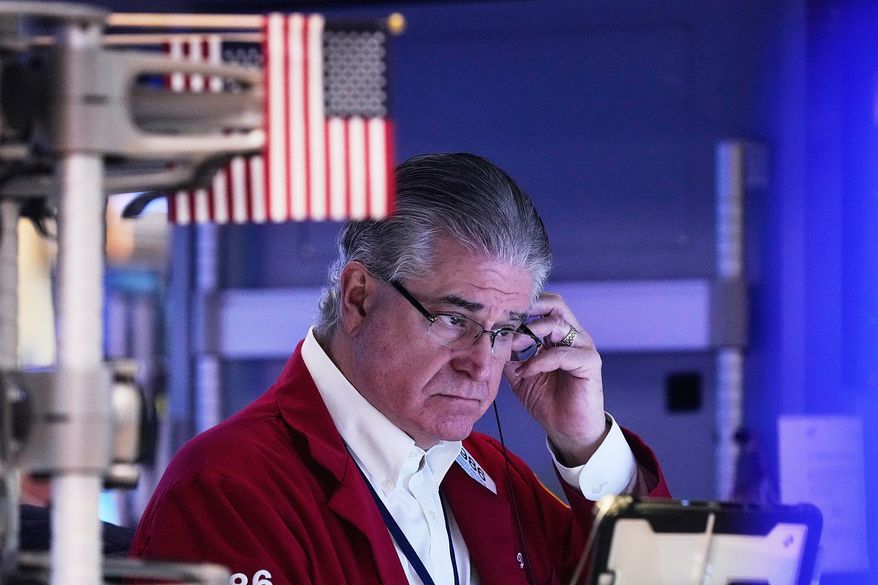 FILE - Trader Daniel Kryger works on the floor of the New York Stock Exchange, Monday, Feb. 2, 2026. (AP Photo/Richard Drew, File)