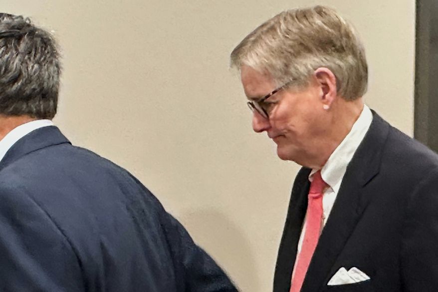 FILE - Edwin Brant Frost IV, a former principal of First Liberty Building and Loan, waits for an elevator, Dec. 22, 2025, in Atlanta. (AP Photo/Jeff Amy, File)