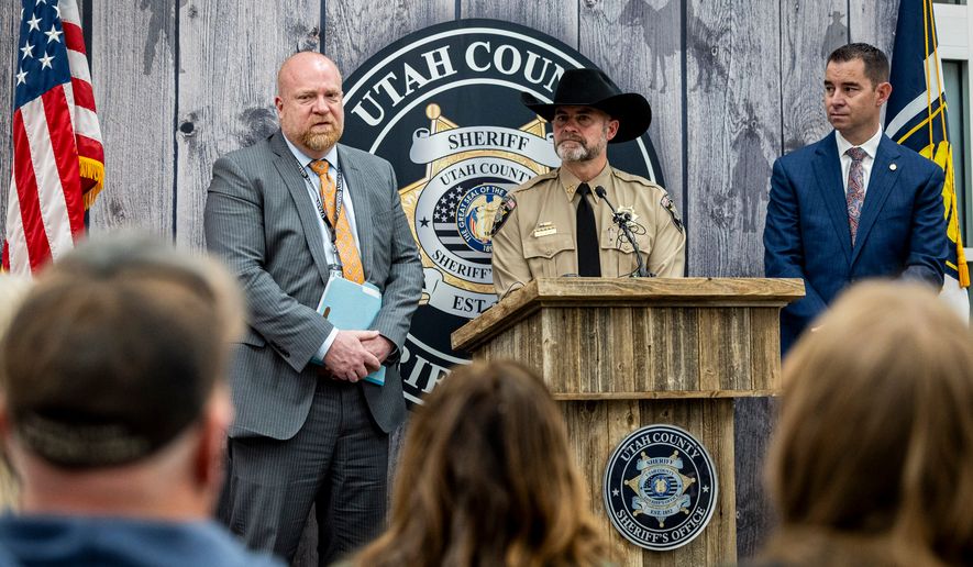 Utah County Sheriff Sgt. Mike Reynolds answers a question while Utah County Sheriff Mike Smith, left, and Commissioner of the Utah Department of Public Safety Beau Mason, right, listen during a news conference to announce that definitive evidence has linked Ted Bundy to the murder of Laura Ann Aime at the Utah County Sheriff's Office in Spanish Fork, Utah, April 1, 2026. (Isaac Hale/The Deseret News via AP, File)