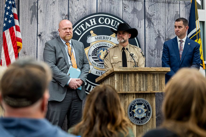 Utah County Sheriff Sgt. Mike Reynolds answers a question while Utah County Sheriff Mike Smith, left, and Commissioner of the Utah Department of Public Safety Beau Mason, right, listen during a news conference to announce that definitive evidence has linked Ted Bundy to the murder of Laura Ann Aime at the Utah County Sheriff's Office in Spanish Fork, Utah, April 1, 2026. (Isaac Hale/The Deseret News via AP, File)