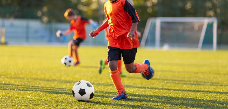 Kids in soccer training. File photo credit: matimix via Shutterstock.
