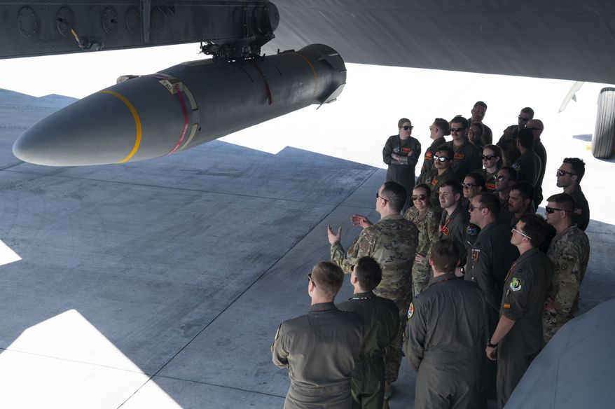 B-52 Stratofortress crews from the 23rd Expeditionary Bomb Squadron, Minot Air Force Base, North Dakota, and the 49th Test and Evaluation Squadron, Barksdale Air Force Base, Louisiana, participated in hypersonic weapon familiarization training at Andersen Air Force Base, Guam, Feb. 27, 2024. The Department of War is developing hypersonic science and technology to ensure the U.S. can rapidly transition operational hypersonic systems. (Credit: U.S. Air Force photo by Staff Sgt. Pedro Tenorio)