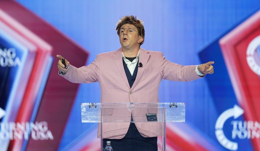 James O'Keefe speaks during Turning Point USA's AmericaFest 2025, Friday, Dec. 19, 2025, in Phoenix. (AP Photo/Ross D. Franklin)