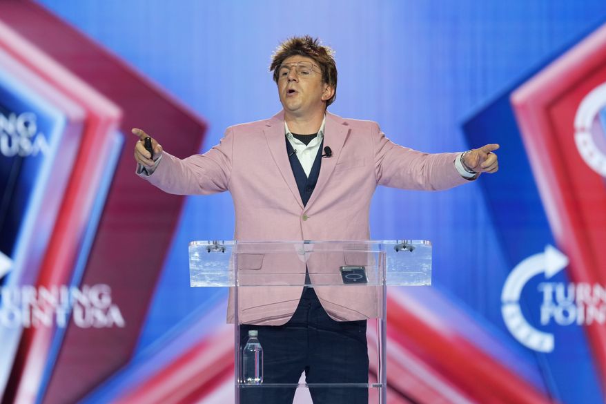 James O'Keefe speaks during Turning Point USA's AmericaFest 2025, Friday, Dec. 19, 2025, in Phoenix. (AP Photo/Ross D. Franklin)