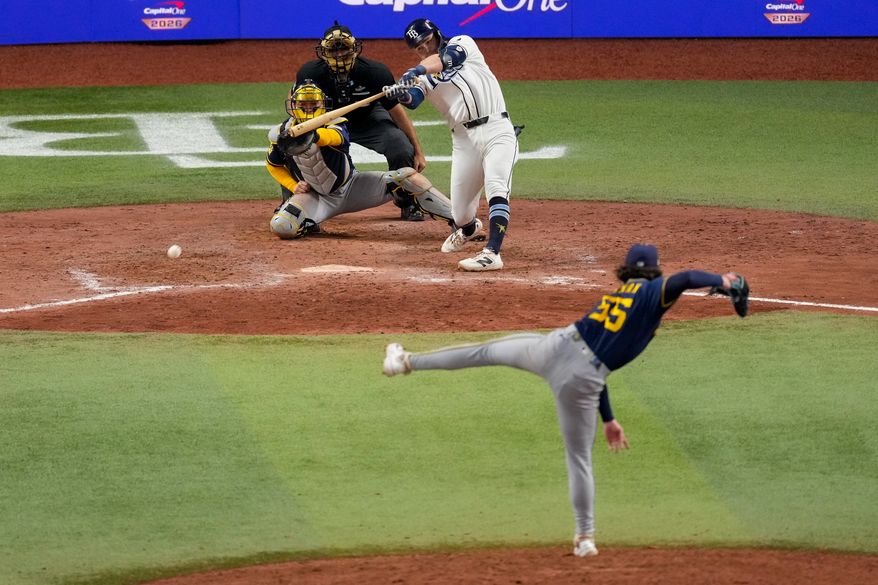Tampa Bay Rays second baseman Ben Williamson connects for a game-winning RBI single off Milwaukee Brewers pitcher Shane Drohan during the 12th inning of Game 4 of baseball's World Series, Wednesday, Oct. 28, 2026, in St. Petersburg, Fla., between the Milwaukee Brewers and the Tampa Bay Rays. (AP Photo/Morry Gash)