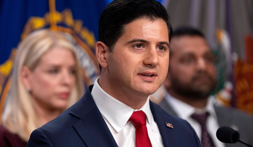 FILE - Bill Essayli, acting U.S. Attorney for the Central District of California, speaks with reporters during a news conference at the Department of Justice, Nov. 19, 2025, in Washington. (AP Photo/Mark Schiefelbein, file)