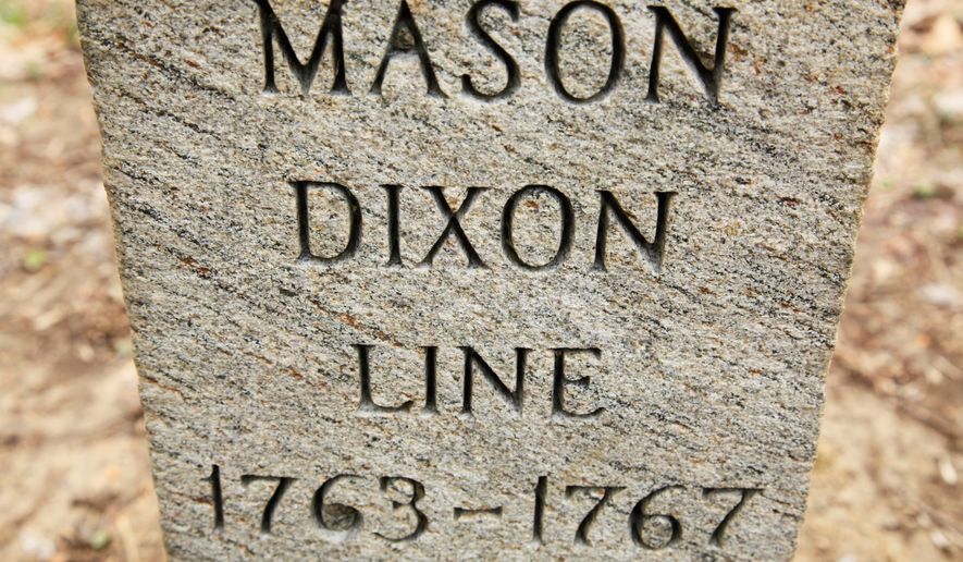 In this Friday, April 15, 2011, photo in Newark Del., shown is a post marking the base point in the survey of Charles Mason and Jeremiah Dixon. Mason and Dixon began their survey a century before the Civil War to settle a border dispute between Pennsylvania and Maryland. (AP Photo/Matt Rourke, File)