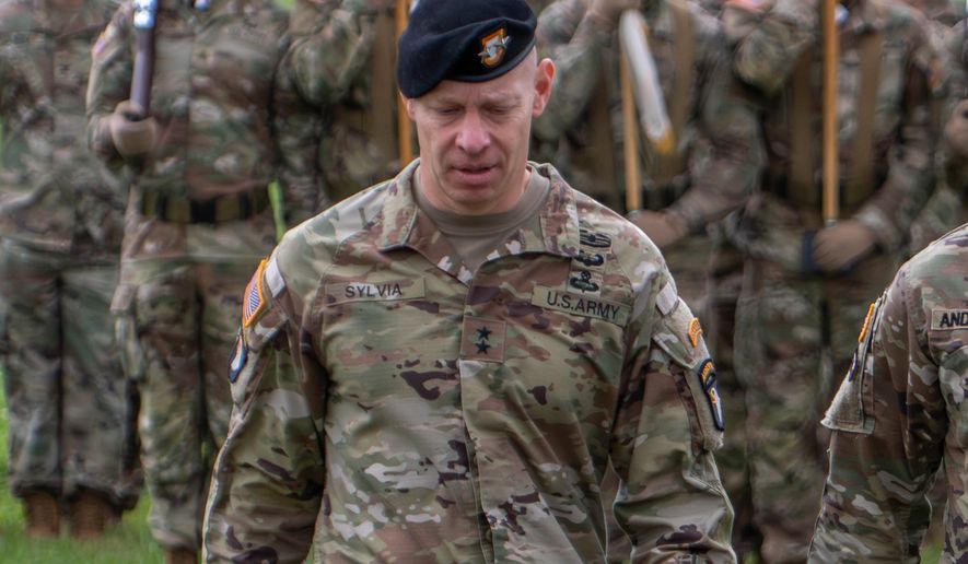 This photo provided by the U.S. Army shows Maj. Gen. Brett Sylvia, at a 101st Airborne Division change of command ceremony at Fort Campbell, Ky., May 30, 2025. (Sgt. Timothy Jackson/U.S Army via AP)