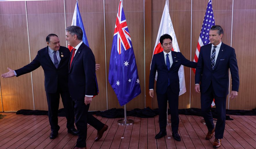 From left, Philippines Defense Secretary Gilberto Teodoro, Australia Defense Minister Richard Marles, Japan Defense Minister Shinjiro Koizumi and U.S.Defense Secretary Pete Hegseth prepare to leave after posing for pictures before holding a Quadrilateral Meeting on the sidelines of the 20th Association of Southeast Asian Nations (ASEAN) Defence Ministers' Meeting (ADMM) and 13th ADMM-Plus Meetings in Cebu, Philippines, Wednesday, Oct. 28, 2026. .(Rolex Dela Pena/Pool Photo via AP)