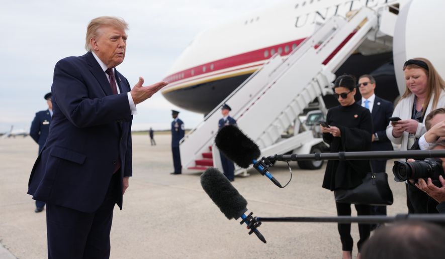 President Donald Trump speaks to reporters before boarding Air Force One, Wednesday, Oct. 28, 2026, at Joint Base Andrews, Md. (AP Photo/Mark Schiefelbein)