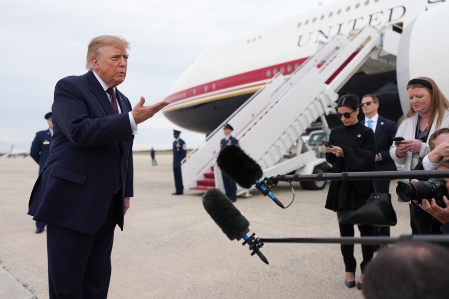 President Donald Trump speaks to reporters before boarding Air Force One, Wednesday, Oct. 28, 2026, at Joint Base Andrews, Md. (AP Photo/Mark Schiefelbein)
