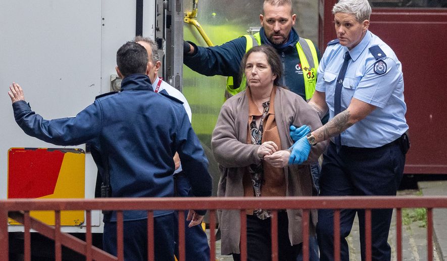 FILE- Erin Patterson arrives at the Supreme Court of Victoria in Melbourne, Australia, Monday, Aug. 25, 2025. (Jason Edwards/AAP Image, POOL via AP, File)