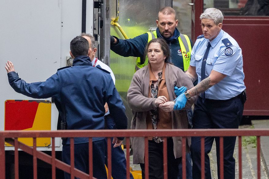 FILE- Erin Patterson arrives at the Supreme Court of Victoria in Melbourne, Australia, Monday, Aug. 25, 2025. (Jason Edwards/AAP Image, POOL via AP, File)