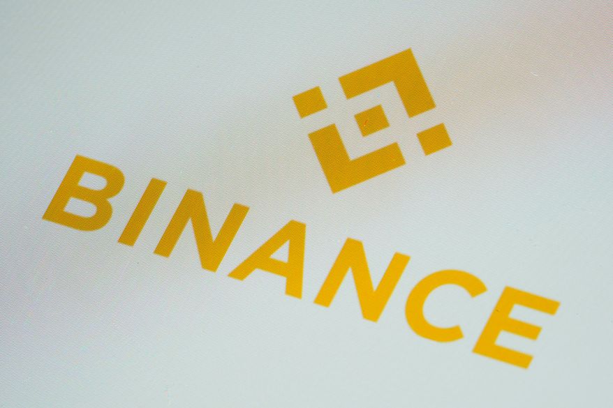 The Binance logo is seen on a smartphone, Feb. 28, 2023, in Marple Township, Pa. (AP Photo/Matt Slocum, File)