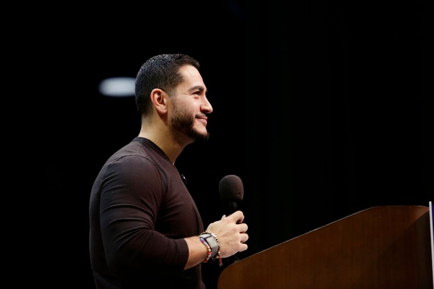 Michigan Senate candidate Abdul El-Sayed speaks to a crowd during a rally, Sunday, Oct. 25, 2026, in Grand Rapids, Mich. (AP Photo/Kristen Norman)