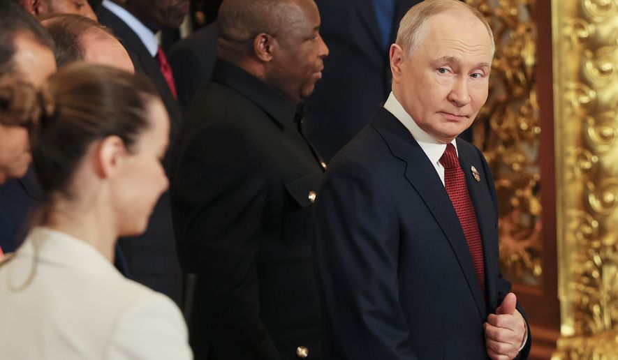 Russian President Vladimir Putin, right, arrives for the Russia-Africa Summit in Moscow, Thursday, Oct. 29, 2026. (Anastasia Barashkova//Pool Photo via AP)