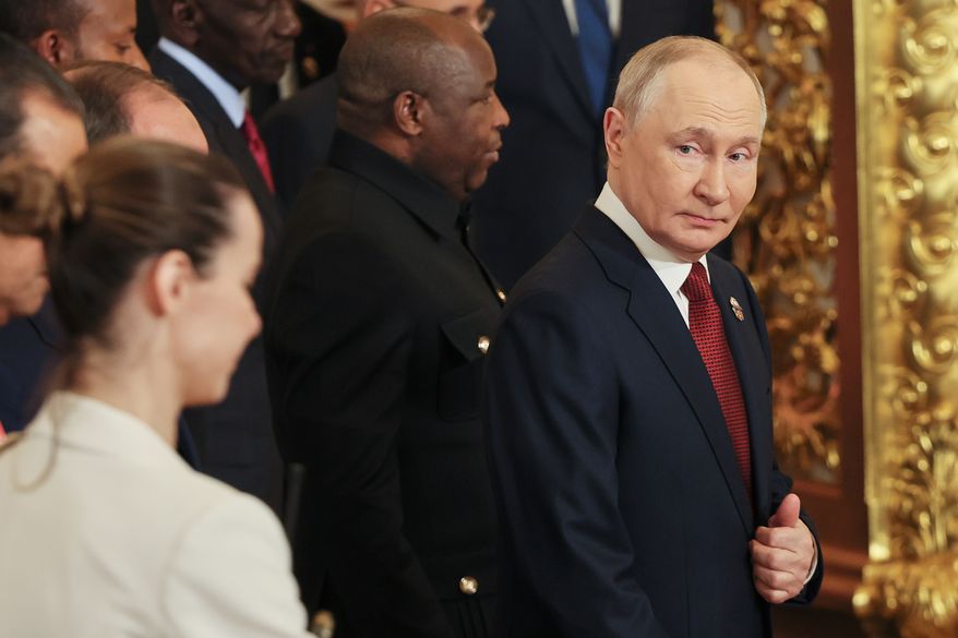 Russian President Vladimir Putin, right, arrives for the Russia-Africa Summit in Moscow, Thursday, Oct. 29, 2026. (Anastasia Barashkova//Pool Photo via AP)