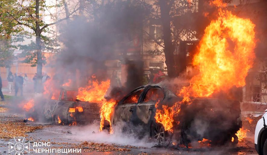 In this photo provided by the Ukrainian Emergency Service, cars are on fire following a Russian air attack in Chernyhiv, Ukraine, Thursday, Oct. 29, 2026. (Ukrainian Emergency Service via AP)