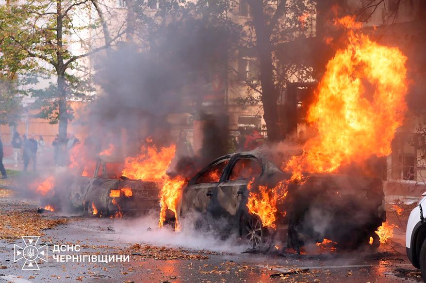 In this photo provided by the Ukrainian Emergency Service, cars are on fire following a Russian air attack in Chernyhiv, Ukraine, Thursday, Oct. 29, 2026. (Ukrainian Emergency Service via AP)