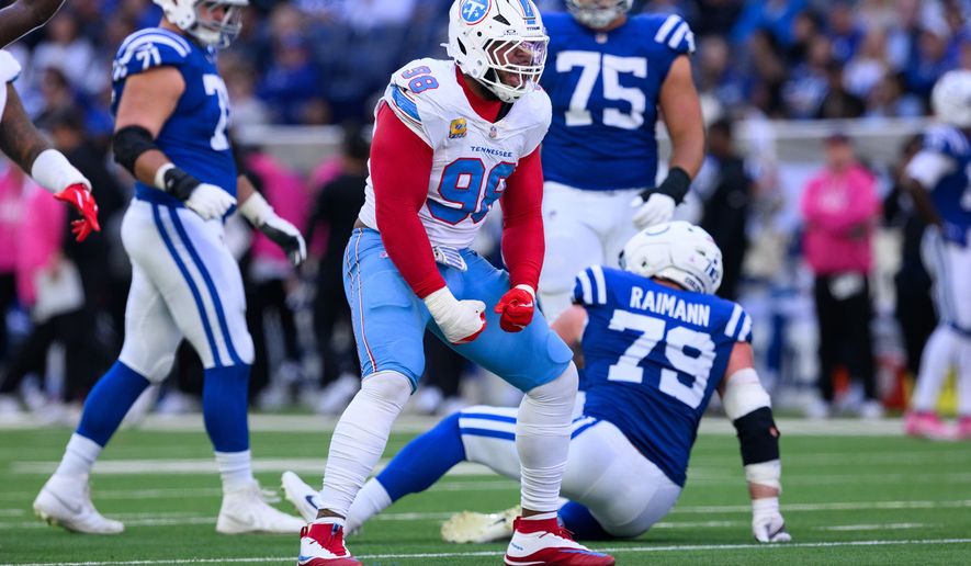 FILE - Tennessee Titans defensive tackle Jeffery Simmons (98) celebrates a sack during an NFL football game against the Indianapolis Colts in Indianapolis, Sunday, Oct. 18, 2026. (AP Photo/Zach Bolinger, File)