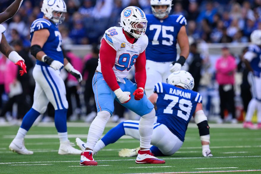 FILE - Tennessee Titans defensive tackle Jeffery Simmons (98) celebrates a sack during an NFL football game against the Indianapolis Colts in Indianapolis, Sunday, Oct. 18, 2026. (AP Photo/Zach Bolinger, File)
