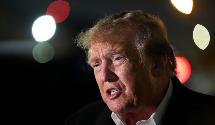 President Donald Trump speaks with reporters as he arrives on Air Force One, Wednesday, Oct. 28, 2026, at Joint Base Andrews, Md. (AP Photo/Alex Brandon)