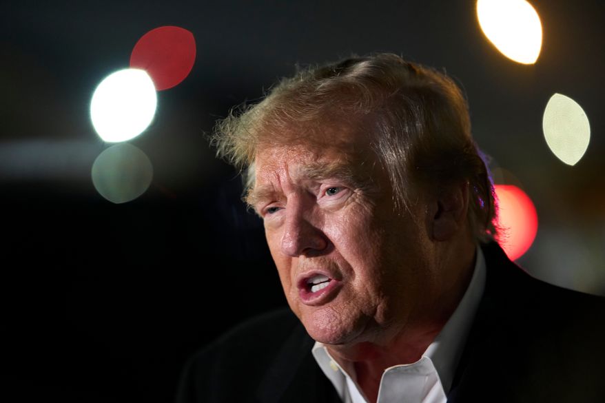 President Donald Trump speaks with reporters as he arrives on Air Force One, Wednesday, Oct. 28, 2026, at Joint Base Andrews, Md. (AP Photo/Alex Brandon)