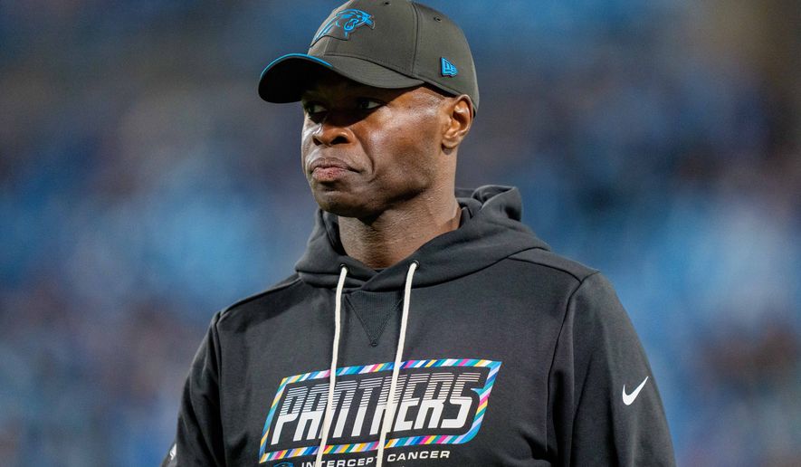 FILE - Carolina Panthers defensive coordinator Ejiro Evero looks on during an NFL football game between the Carolina Panthers and the Detroit Lions on Sunday, Oct. 4, 2026, in Charlotte, N.C. (AP Photo/Jacob Kupferman, File)