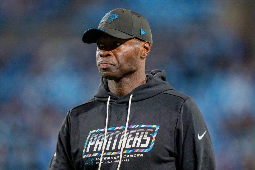 FILE - Carolina Panthers defensive coordinator Ejiro Evero looks on during an NFL football game between the Carolina Panthers and the Detroit Lions on Sunday, Oct. 4, 2026, in Charlotte, N.C. (AP Photo/Jacob Kupferman, File)