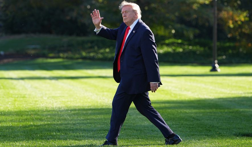 President Donald Trump walks to board Marine One from the South Lawn of the White House, Friday, Oct. 30, 2026, in Washington. (AP Photo/Alex Brandon)