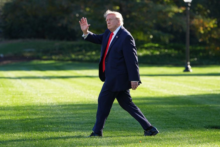 President Donald Trump walks to board Marine One from the South Lawn of the White House, Friday, Oct. 30, 2026, in Washington. (AP Photo/Alex Brandon)